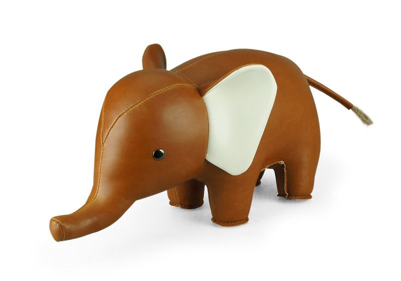 Buchstütze Elefant: Detailaufnahme des Züny Classic Elefant in Tan/Weiß, stilvolle Dekoration für Bücherregale.